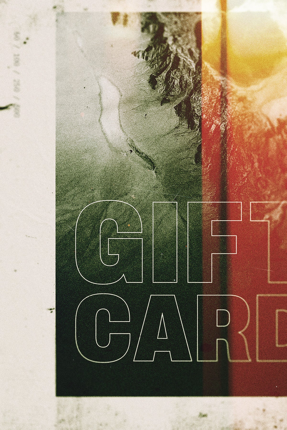 Gift card with textured surface and 'GIFT CARD' text overlay