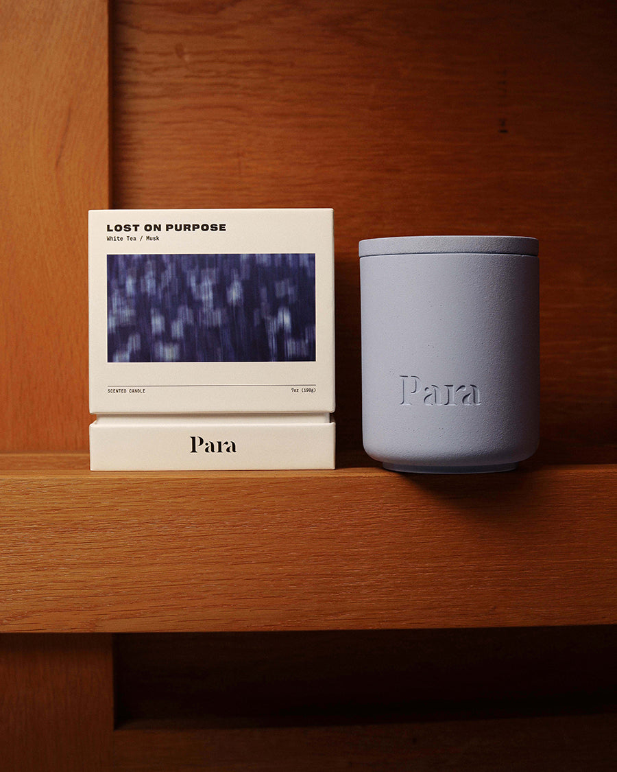Lost on Purpose hand-poured white tea and musk candle in a blue concrete vessel by Para Home Studio