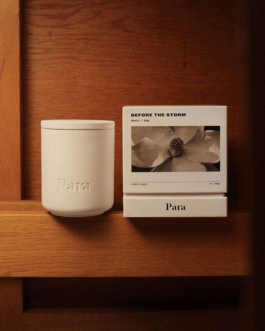 Minimalist white cement candle jar with lid featuring luxury neroli and palo santo fragrance