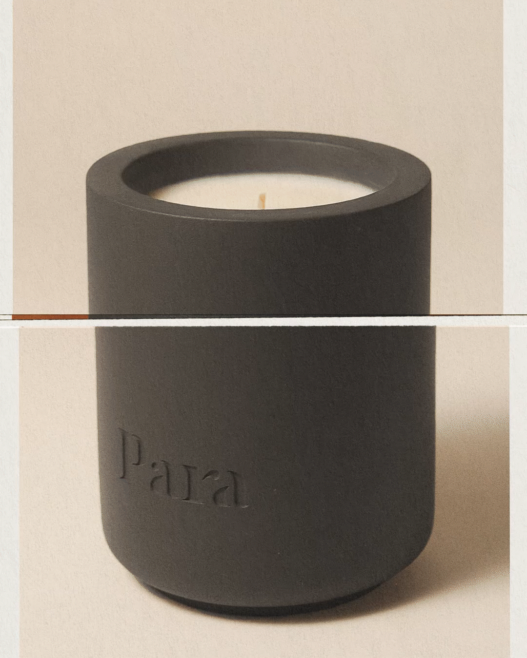 Minimalist black cement candle jar with lid featuring luxury palo santo and incense fragrance