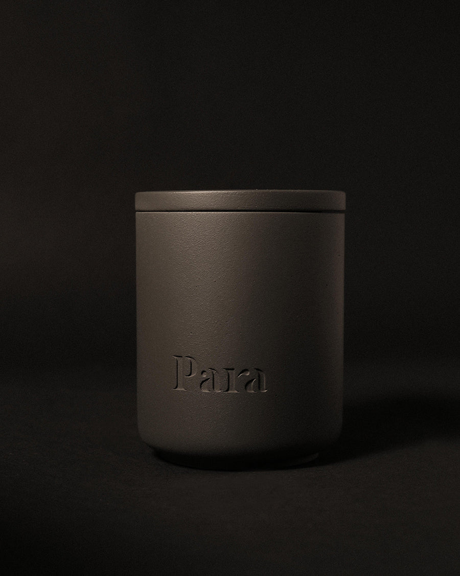 After Hours Club hand-poured palo santo and saffron candle in a black concrete vessel by Para Home Studio