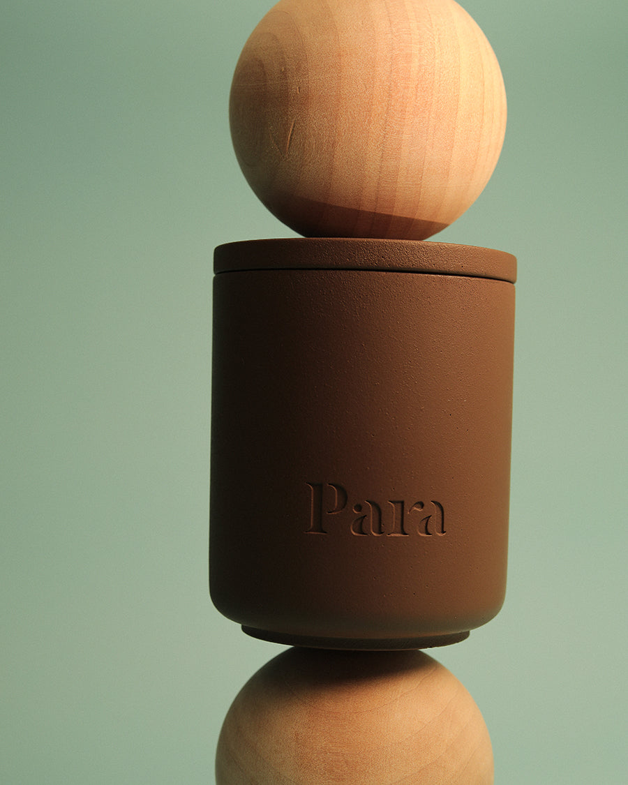 Minimalist brown cement candle jar with lid featuring luxury sandalwood and vetiver fragrance
