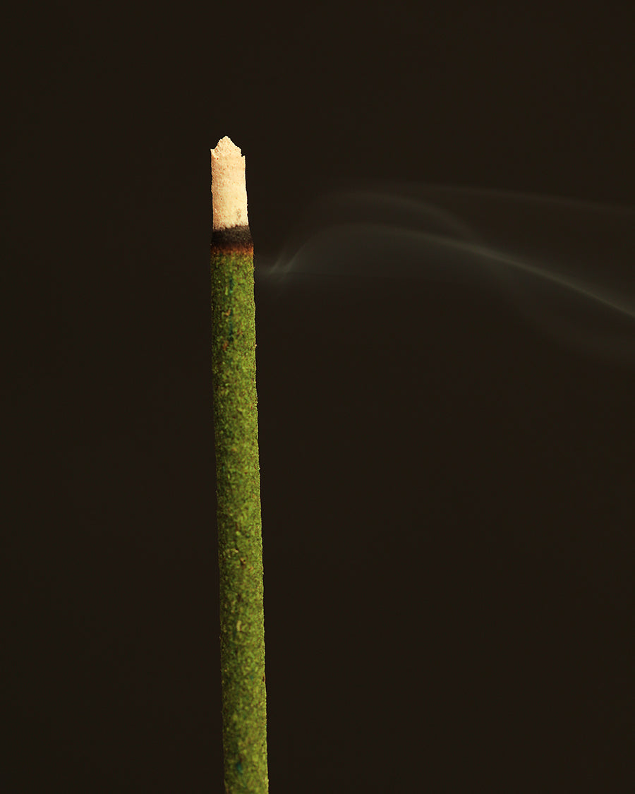 Incense stick with smoke against a black background 100% naturally derived Japanese incense sticks made for spiritual cleansing and purification