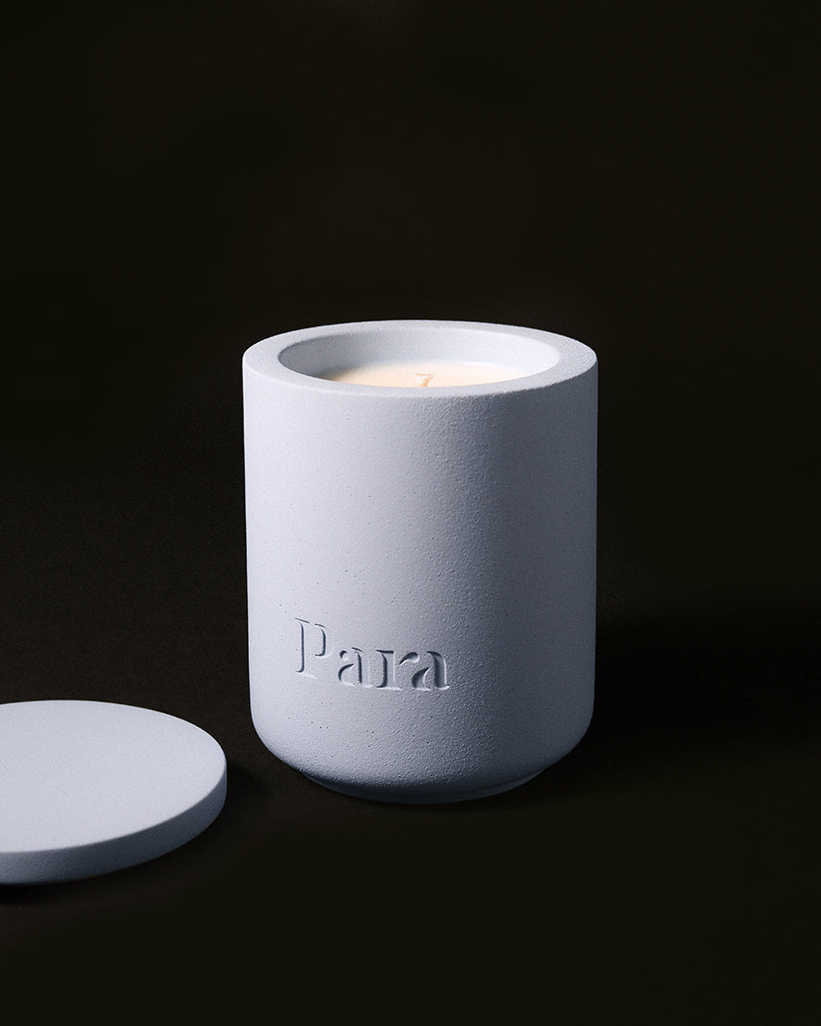 Lost on Purpose hand-poured white tea and musk candle in a blue concrete vessel by Para Home Studio