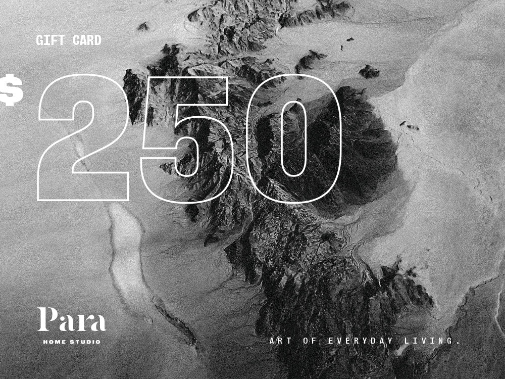 Gift card with 250 dollars and Para Home Studio branding over a black and white landscape.