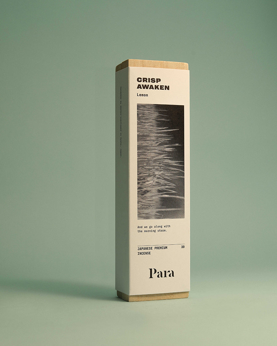 Product packaging with 'Crisp Awaken' and 'Para' branding on a green background