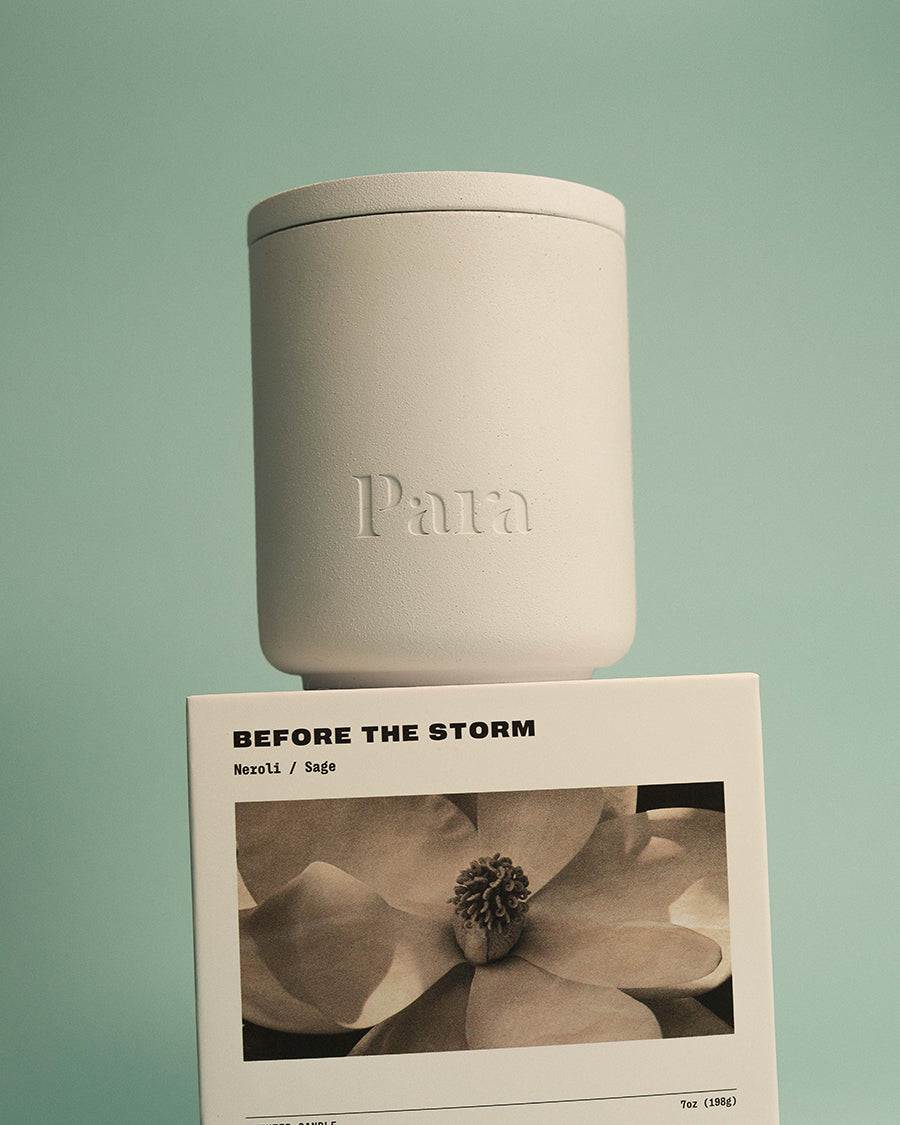 Minimalist white cement candle jar with lid featuring luxury neroli and palo santo fragrance