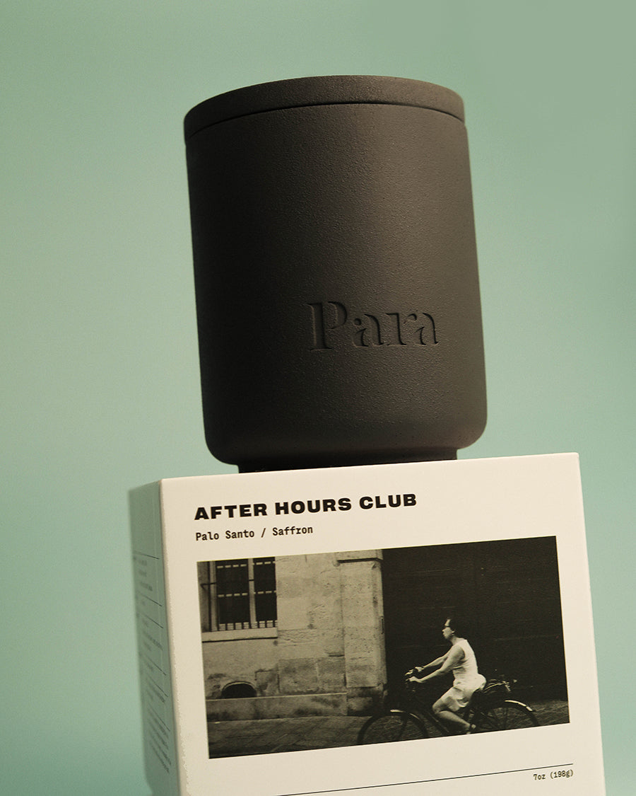 Minimalist black cement candle jar with lid featuring luxury palo santo and incense fragrance