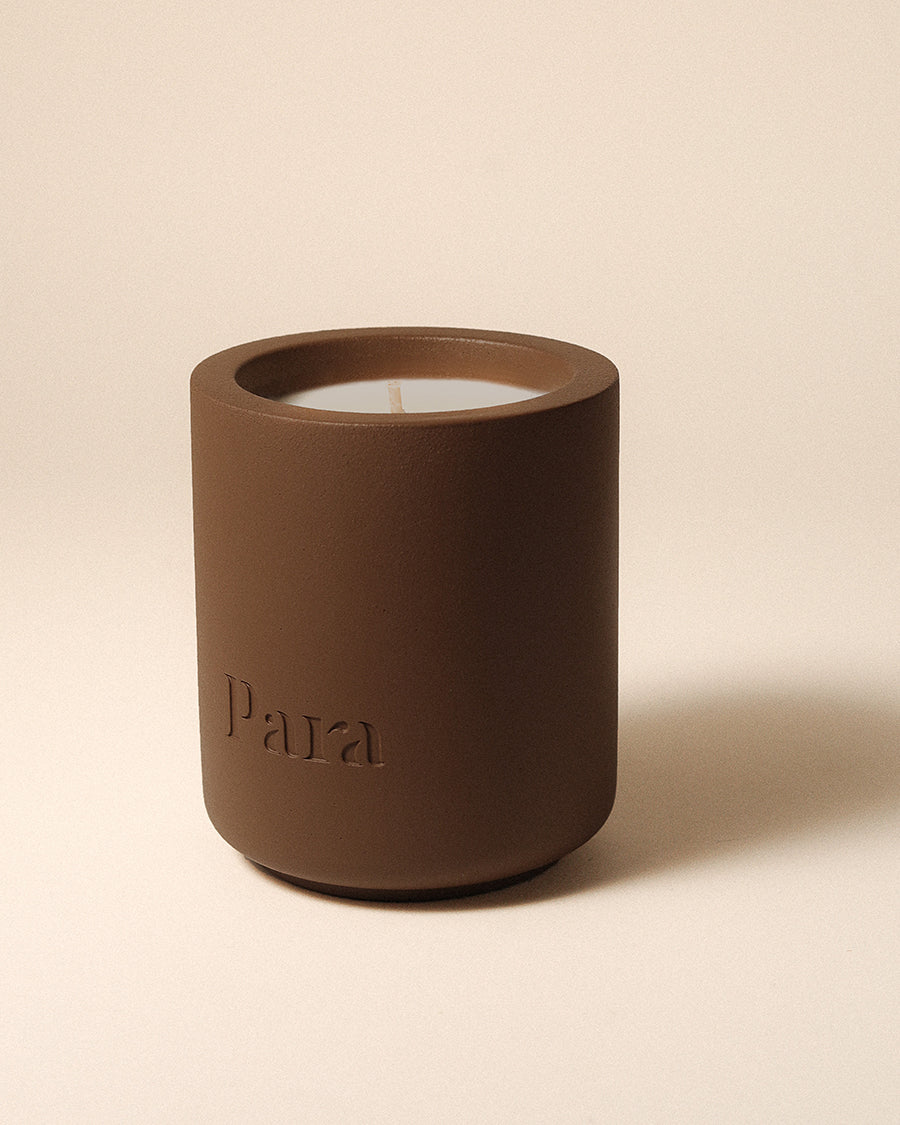 Minimalist brown cement candle jar with lid featuring luxury sandalwood and vetiver fragrance